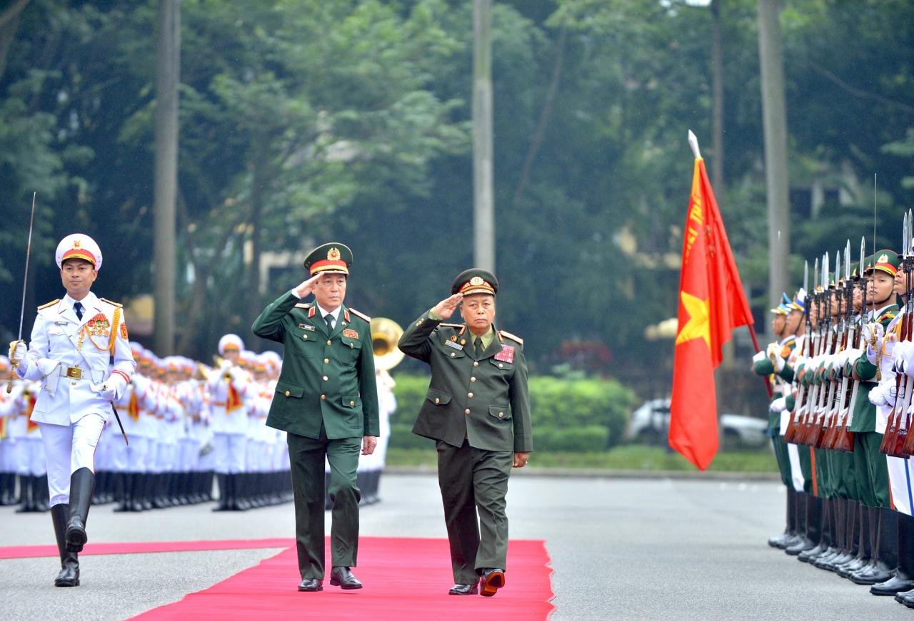 Đại tướng Lương Cường chủ trì lễ đón Chủ nhiệm Tổng cục Chính trị QĐND Lào - Ảnh 4.