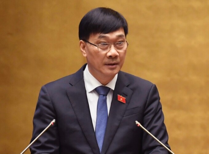 Ông Vũ Hồng Thanh, Chủ nhiệm Ủy ban Kinh tế trình bày báo cáo giải trình, tiếp thu trước khi Quốc hội bấm nút thông qua Luật Kinh doanh bất động sản (sửa đổi), ngày 28/11. Ảnh: Hoàng Phong