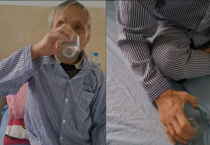 Bệnh nhân có thể cầm ly và uống nước sau khi sử dụng thiết bị của nhóm. Ảnh: NVCC