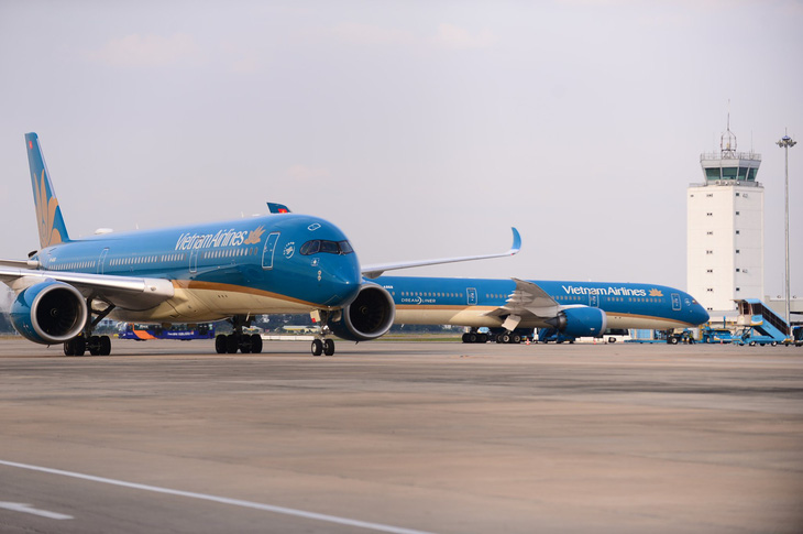 ACV ủng hộ Vietnam Airlines đầu tư dịch vụ mặt đất ở Long Thành- Ảnh 1. - Vietnam.vn Máy bay Vietnam Airlines khai thác ở sân bay Tân Sơn Nhất - Ảnh: QUANG ĐỊNH