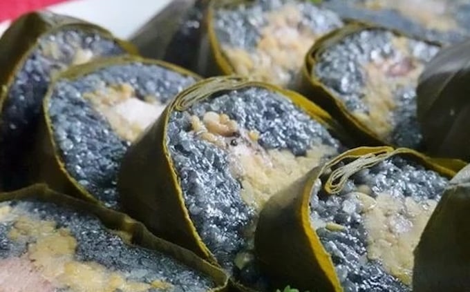 banh-chung-den-31-175912_131.jpg Bánh chưng đen - món ăn không thể thiếu của bà con dân tộc Tày ở Văn Bàn (Lào Cai). Ảnh: T.L.
