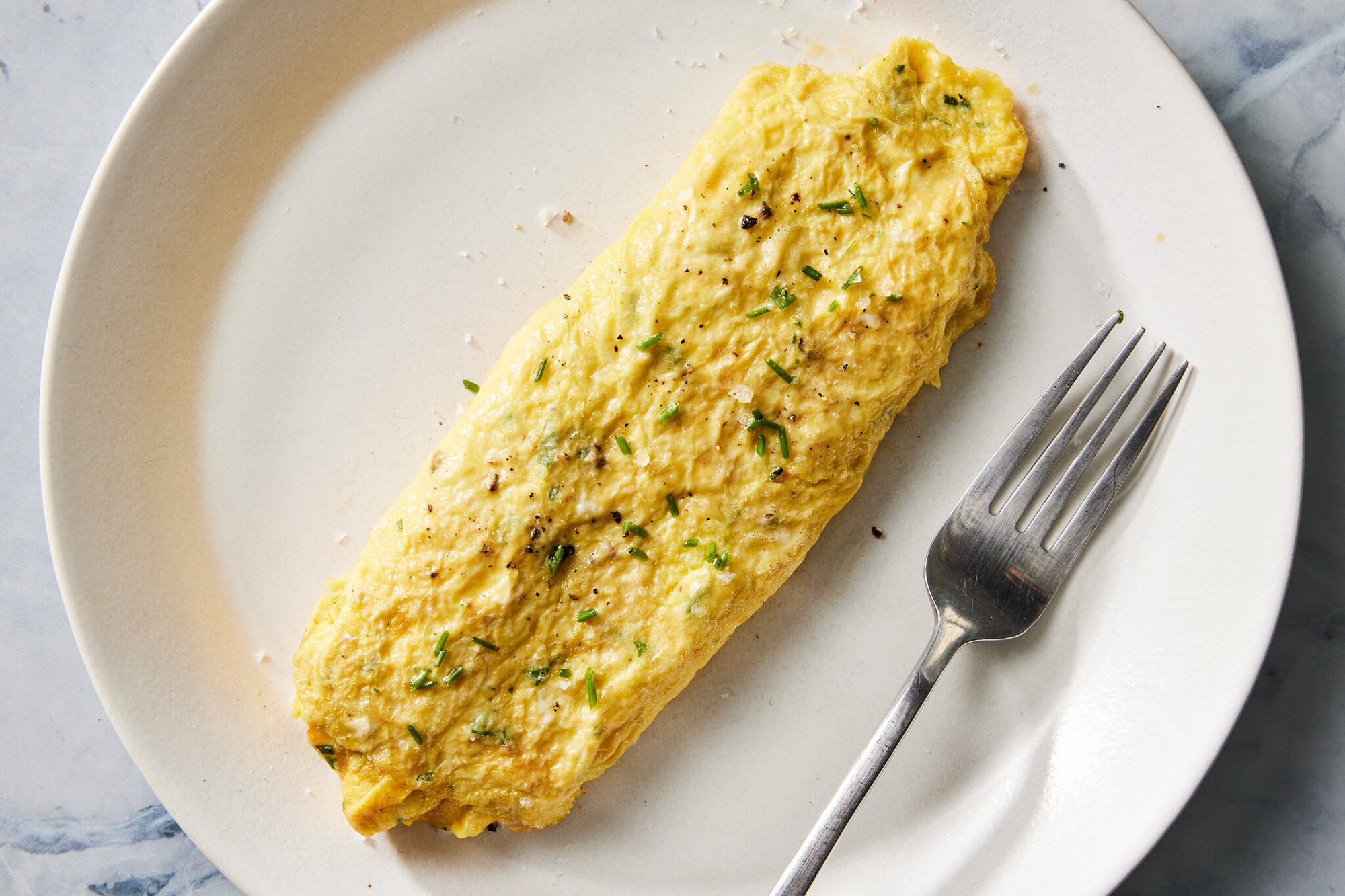 Món trứng tráng kiểu Pháp tuy đơn giản nhưng rất ngon miệng - Ảnh: The New York Times
