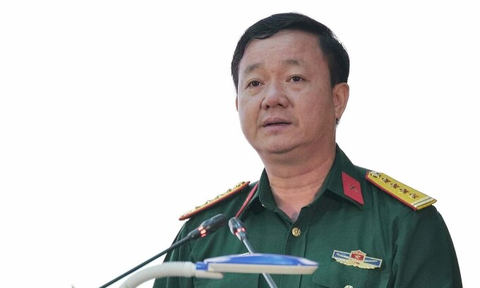 Đại tá Nguyễn Văn Trường phát biểu tham luận tại hội thảo ngày 27/3. Ảnh: Ngọc Thành
