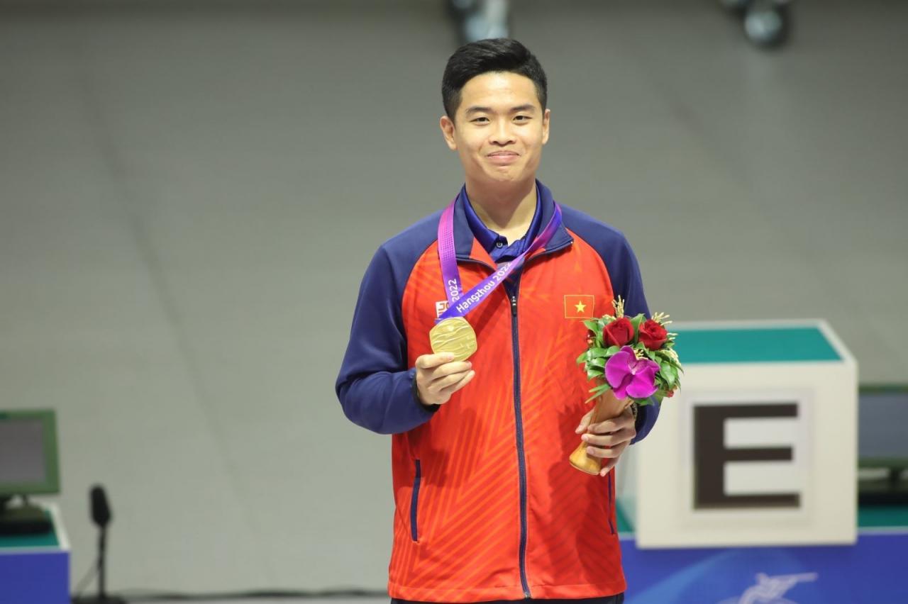Pham-Quang-Huy-Guong-mat-the-thao-cua-nam-2 - Vietnam.vn Chú thích ảnh