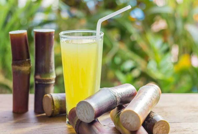 Dùng nước mía tránh mất nước ngày nắng nóng và chữa nhiều bệnh- Ảnh 2. Nước mía có thể phòng chữa nhiều bệnh - Ảnh minh họa