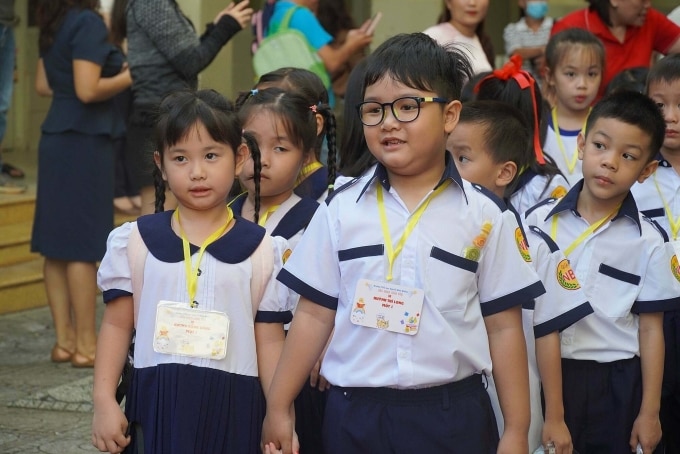 Học sinh trường Tiểu học Nguyễn Bỉnh Khiêm, TP HCM, trong ngày tựu trường, tháng 8/2023. Ảnh: Lệ Nguyễn