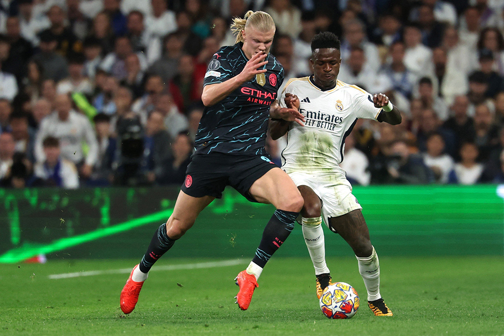 Arsenal và Man.City vượt chướng ngại vật- Ảnh 1. Haaland (trái) vẫn sẽ là mũi nhọn đáng sợ của Man.City trong trận lượt về gặp Real Madrid