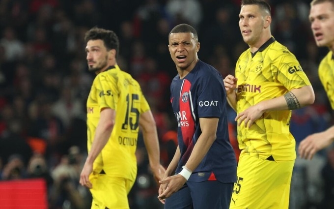 Các cầu thủ Dortmund thành công trong việc vô hiệu hóa Mbappe (áo sẫm) trong cả hai trận bán kết Champions League. Ảnh: LP