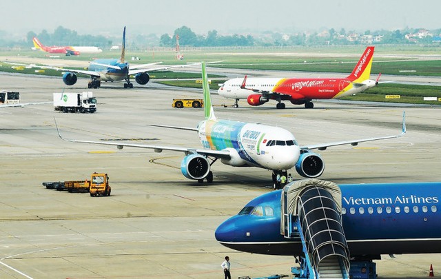 Giá vé máy bay tăng cao: Cục Hàng không báo cáo 'vẫn nằm trong khung giá'- Ảnh 2. Giá vé máy bay tăng cao: Cục Hàng không báo cáo 'vẫn nằm trong khung giá'- Ảnh 2.