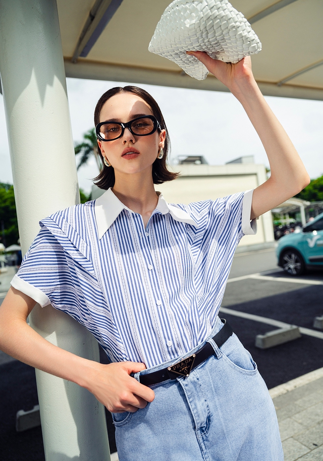 Công sở cuối hè vẫn chuộng áo sơ mi, quần jeans và váy liền đa năng- Ảnh 1. Công sở cuối hè vẫn chuộng áo sơ mi, quần jeans và váy liền đa năng- Ảnh 1.