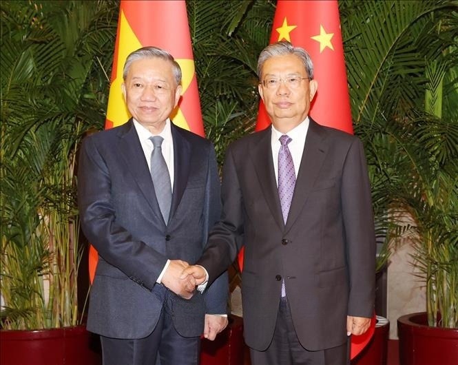 Tổng Bí thư, Chủ tịch nước Tô Lâm và Ủy viên trưởng Nhân đại toàn quốc Trung Quốc Triệu Lạc Tế. Ảnh: TTXVN