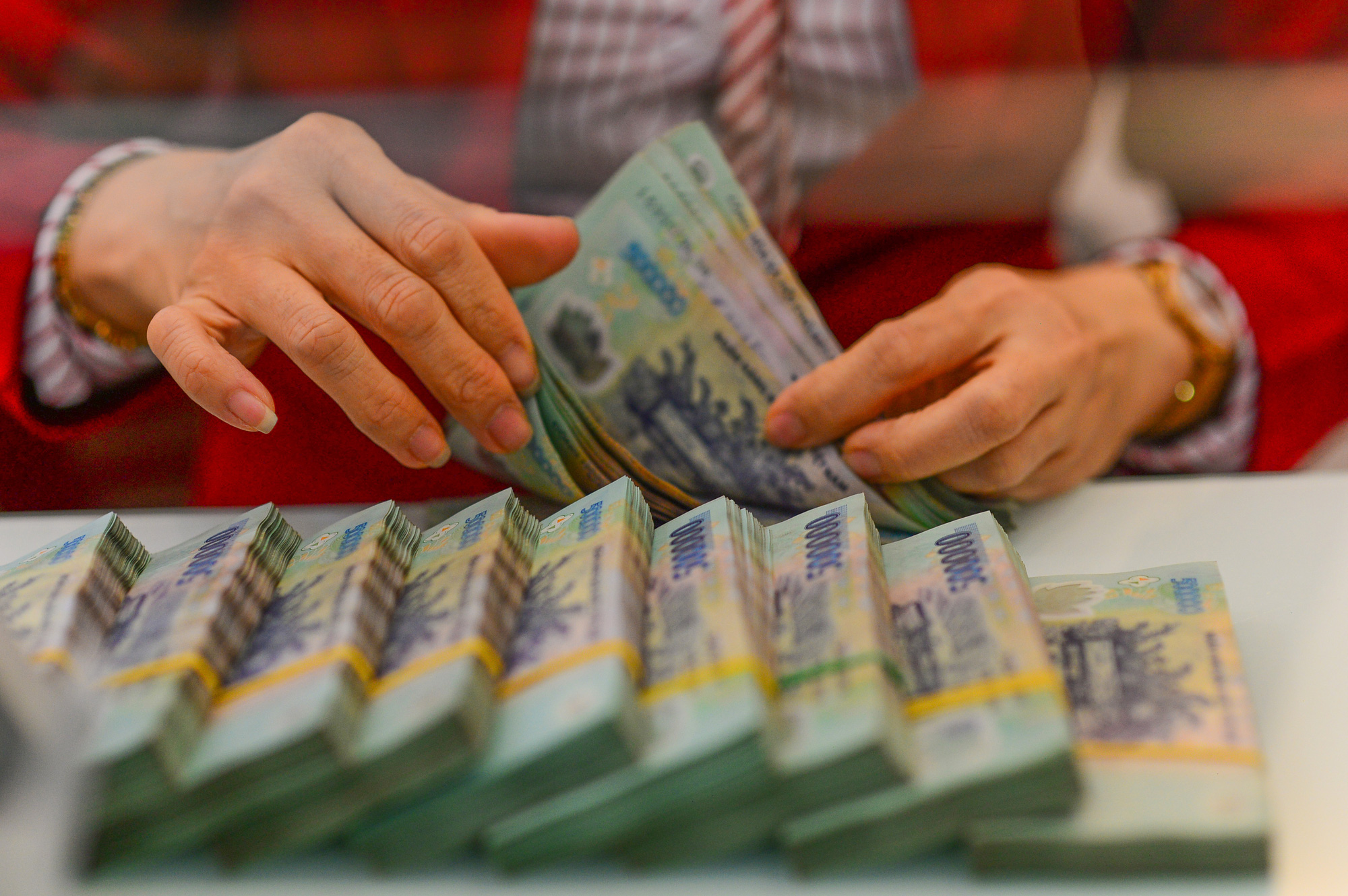 ‘Vua tiền mặt’ sàn chứng khoán: Dầu khí áp đảo, mang hàng chục ngàn tỉ gửi ngân hàng- Ảnh 1. "Tiền mặt là vua" là một câu nói quen thuộc nhấn mạnh vai trò quan trọng của tiền mặt trong thời kỳ kinh tế có nhiều biến động - Ảnh: QUANG ĐỊNH