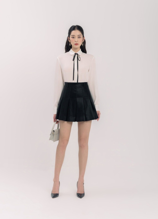 Bí quyết trở thành tâm điểm của mọi ánh nhìn với váy mini skirt- Ảnh 4. Bí quyết trở thành tâm điểm của mọi ánh nhìn với váy mini skirt- Ảnh 4.