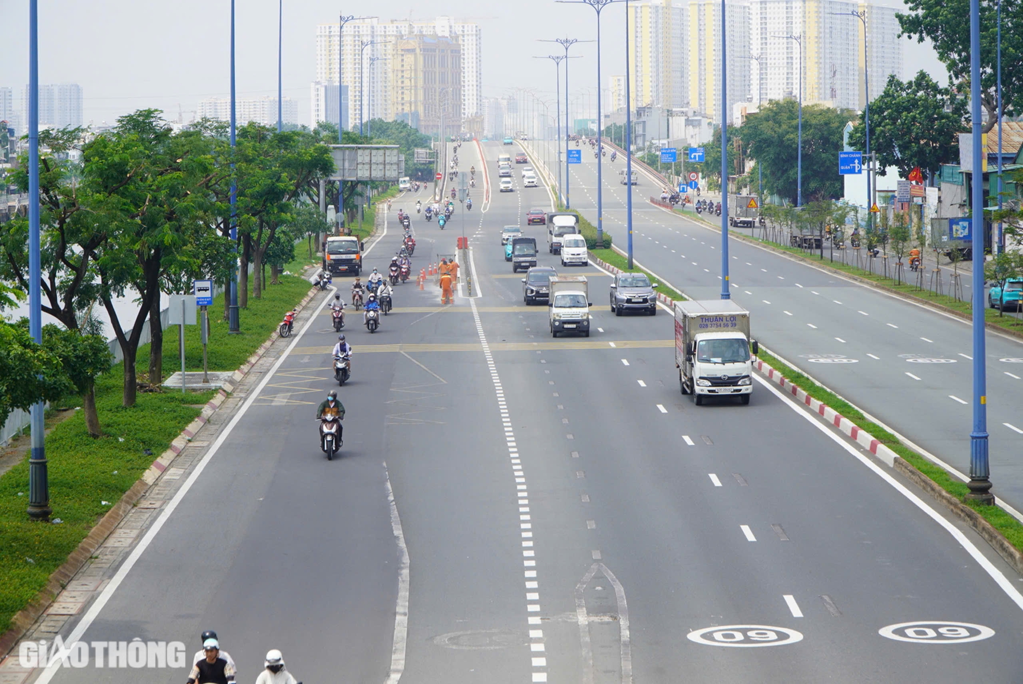 Toàn cảnh Đại lộ Võ Văn Kiệt sau 4 tháng thi công xoá bỏ dải phân cách làn xe máy- Ảnh 1. Toàn cảnh Đại lộ Võ Văn Kiệt sau 4 tháng thi công xoá bỏ dải phân cách làn xe máy- Ảnh 1.