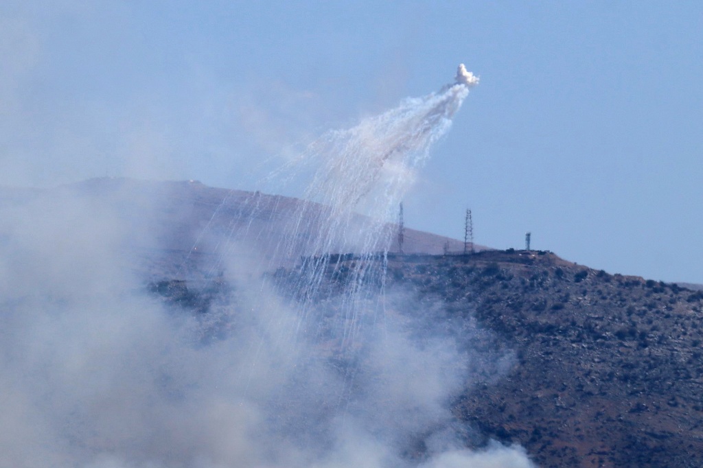 Israel dồn dập không kích Beirut và tấn công Gaza- Ảnh 1. Israel dồn dập không kích Beirut và tấn công Gaza- Ảnh 1.