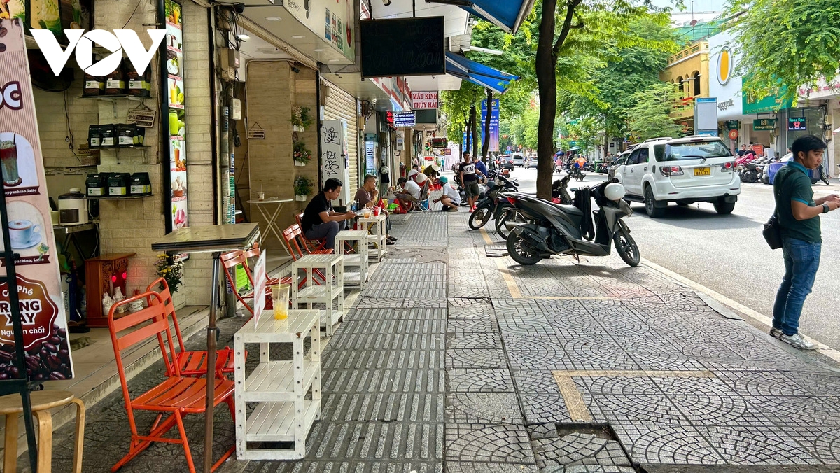 thu phí sử dụng vỉa hè khu trung tâm tp.hcm vẫn còn băn khoăn hình ảnh 2 thu phi su dung via he khu trung tam tp.hcm van con ban khoan hinh anh 2
