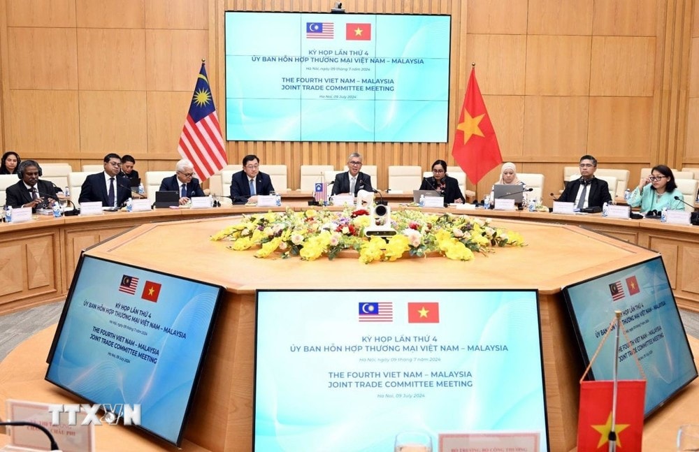 Kỳ họp thứ 4 Ủy ban Hỗn hợp Thương mại Việt Nam-Malaysia. (Ảnh: Trần Việt/TTXVN) ttxvn-viet_nam-malaysia.jpg