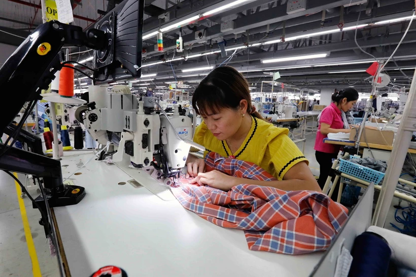 Ngành dệt may Việt Nam sẽ được hưởng lợi nhờ RCEP. (Nguồn: TTXVN)