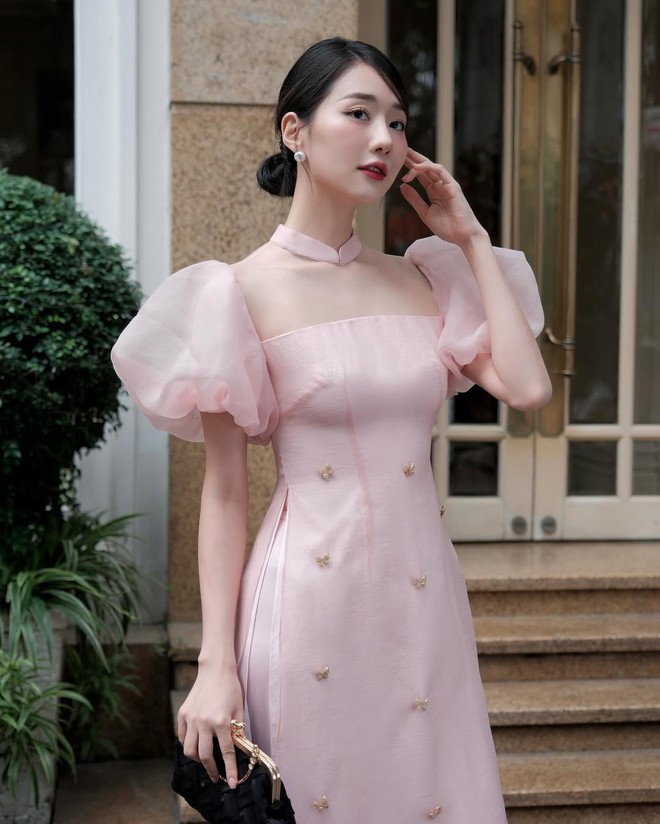 Áo dài cách điệu không thể ‘vắng bóng’ trong những ngày tết- Ảnh 2. Áo dài cách điệu không thể ‘vắng bóng’ trong những ngày tết- Ảnh 2.