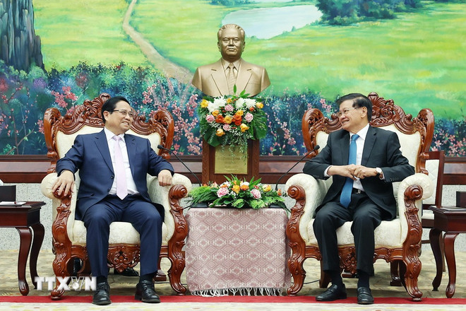 Thủ tướng Phạm Minh Chính và Tổng Bí thư, Chủ tịch nước Lào Thongloun Sisoulith. (Ảnh: Dương Giang/TTXVN) ttxvn-pham-minh-chinh-tong-bi-thu-lao-2.jpg